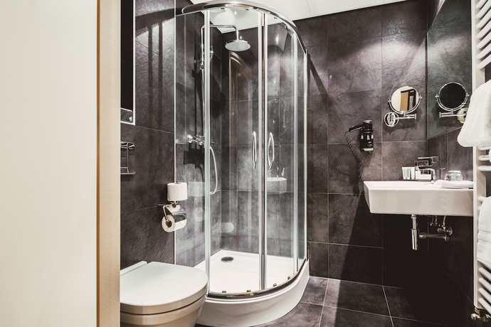 Imagen de la habitación del Hotel Post-plaza and Grand Café. Foto 11