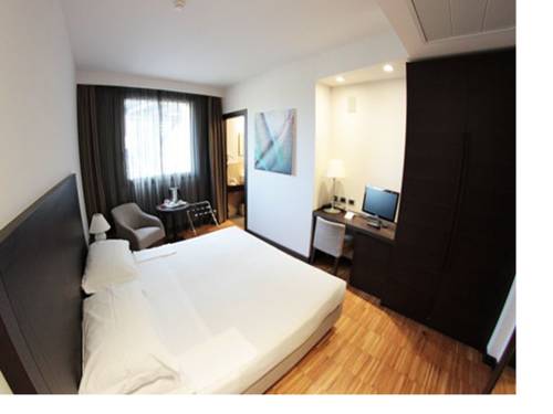 Imagen de la habitación del Hotel Postumia Design. Foto 7