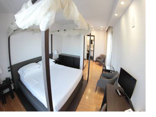 Imagen de la habitación del Hotel Postumia Design. Foto 11