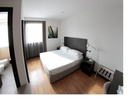 Imagen de la habitación del Hotel Postumia Design. Foto 13