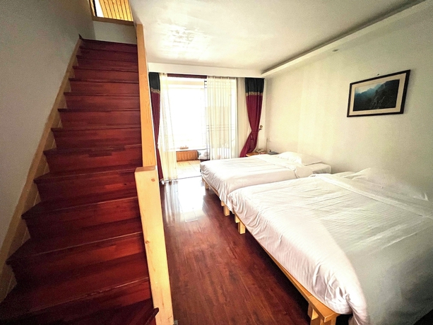 Imagen de la habitación del Hotel Potala Hot Spring Resort Dali. Foto 7