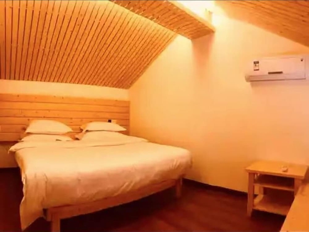 Imagen de la habitación del Hotel Potala Hot Spring Resort Dali. Foto 8