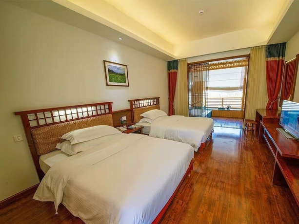Imagen de la habitación del Hotel Potala Hot Spring Resort Dali. Foto 9