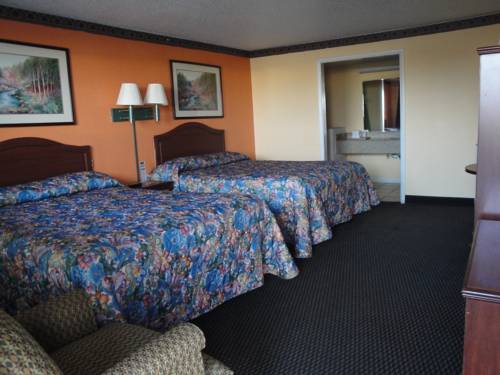 Imagen de la habitación del Hotel Poteau Inn. Foto 2