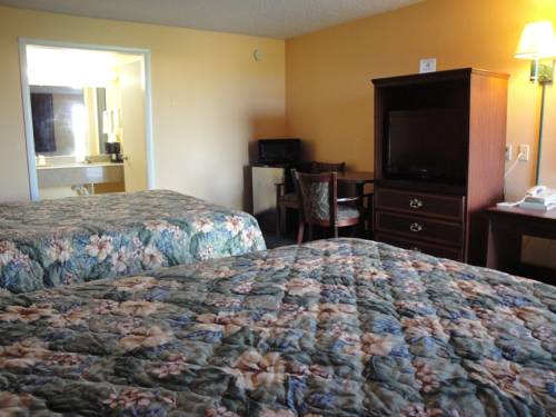 Imagen de la habitación del Hotel Poteau Inn. Foto 7