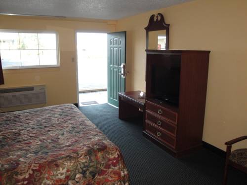 Imagen de la habitación del Hotel Poteau Inn. Foto 11