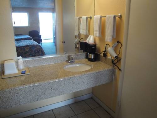 Imagen de la habitación del Hotel Poteau Inn. Foto 13