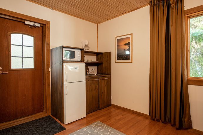 Imagen de la habitación del Hotel Poukama. Foto 6