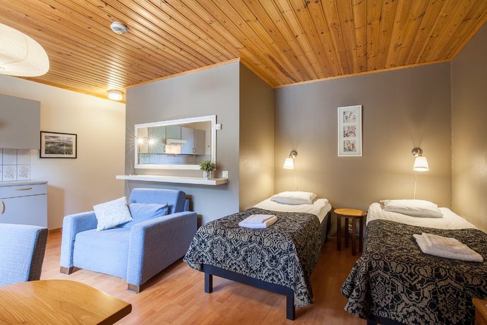 Imagen de la habitación del Hotel Poukama. Foto 11