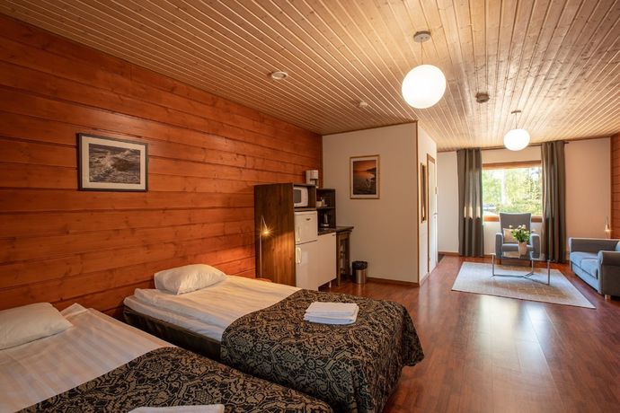 Imagen de la habitación del Hotel Poukama. Foto 13