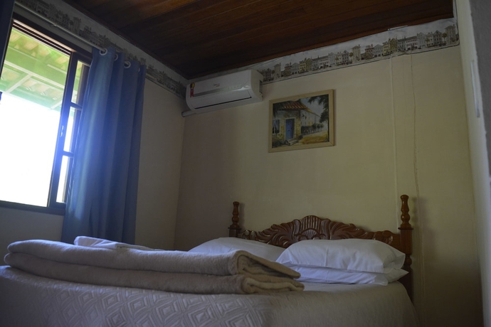 Imagen de la habitación del Hotel Pousada &Aacute;gua Cristalina. Foto 6