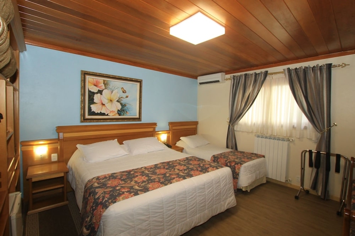 Imagen de la habitación del Hotel Pousada &Aacute;guia Branca. Foto 15