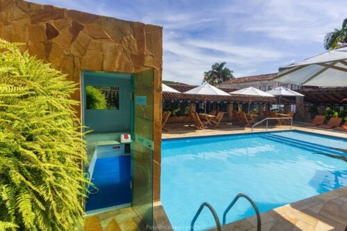 Imagen de la piscina del Hotel Pousada Aconchego. Foto 18