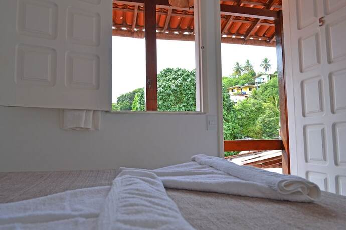 Imagen de la habitación del Hotel Pousada Aconchego. Foto 15