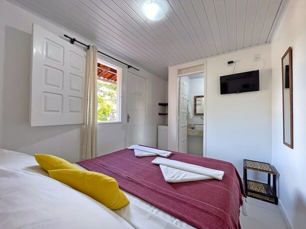 Imagen de la habitación del Hotel Pousada Aconchego. Foto 20