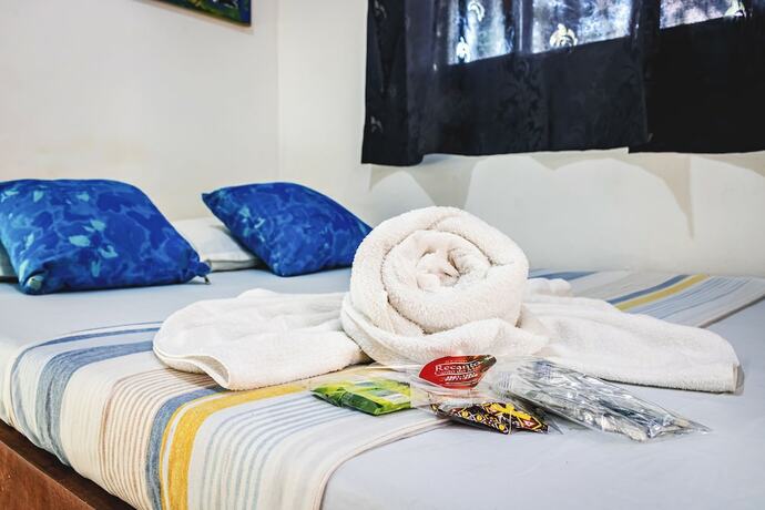 Imagen de la habitación del Hotel Pousada Aconchego Recanto Canto do Mar. Foto 11