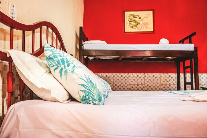 Imagen de la habitación del Hotel Pousada Aconchego Recanto Canto do Mar. Foto 12