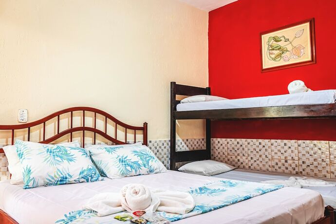 Imagen de la habitación del Hotel Pousada Aconchego Recanto Canto do Mar. Foto 15
