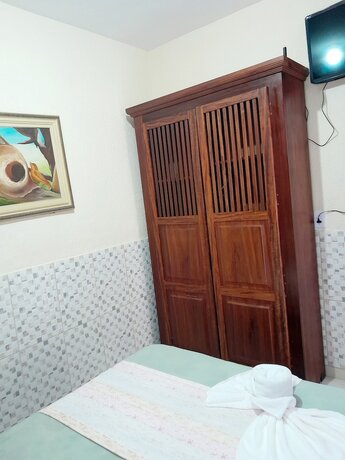 Imagen de la habitación del Hotel Pousada Aconchego Recanto Canto do Mar. Foto 16