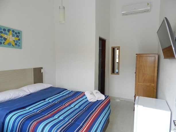 Imagen de la habitación del Hotel Pousada Acqua Infinity. Foto 6