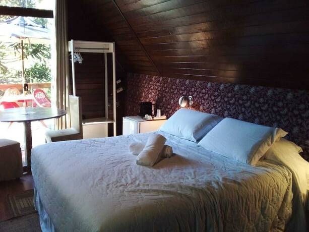 Imagen de la habitación del Hotel Pousada Alpes. Foto 14