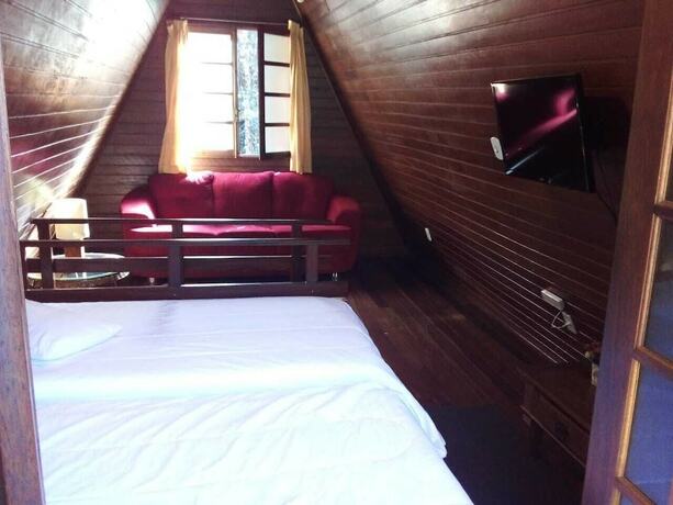 Imagen de la habitación del Hotel Pousada Alpes. Foto 15