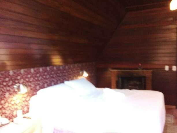 Imagen de la habitación del Hotel Pousada Alpes. Foto 18