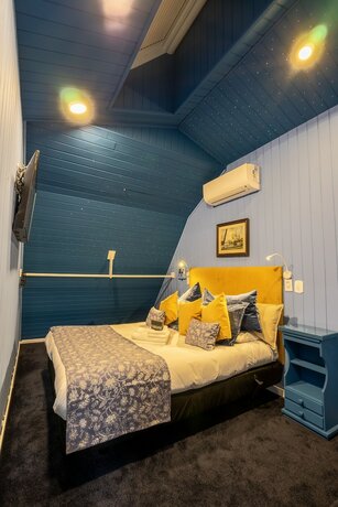 Imagen de la habitación del Hotel Pousada Alto da Boa Vista, Campos do Jordao. Foto 13