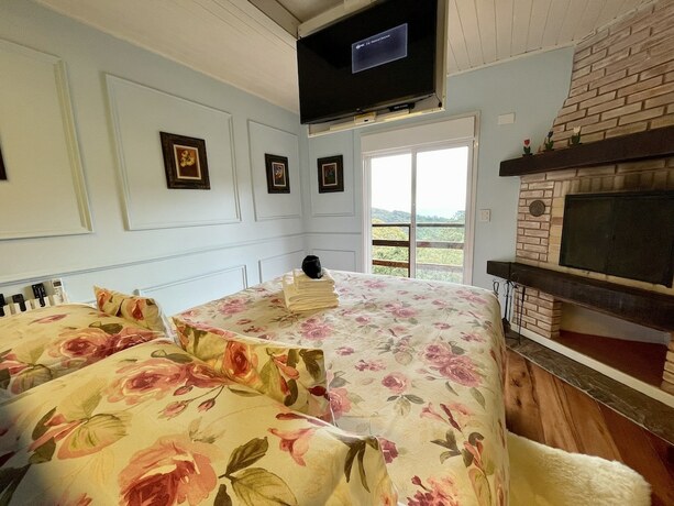 Imagen de la habitación del Hotel Pousada Alto da Boa Vista, Campos do Jordao. Foto 14