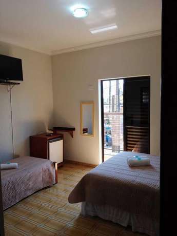 Imagen de la habitación del Hotel Pousada Amanhecer do Itagu&aacute;. Foto 7