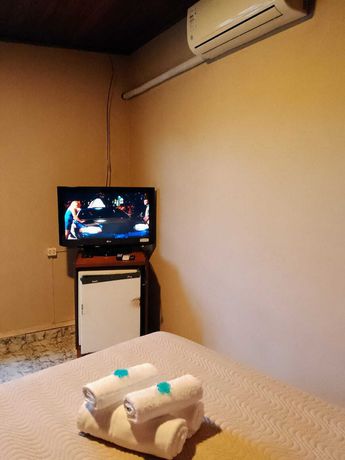 Imagen de la habitación del Hotel Pousada Amanhecer do Itagu&aacute;. Foto 8