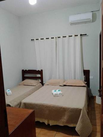 Imagen de la habitación del Hotel Pousada Amanhecer do Itagu&aacute;. Foto 10
