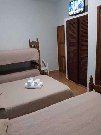 Imagen de la habitación del Hotel Pousada Amanhecer do Itagu&aacute;. Foto 12