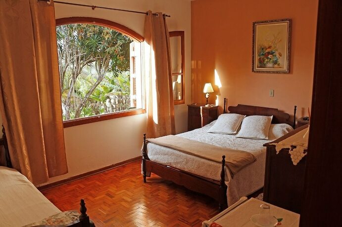 Imagen de la habitación del Hotel Pousada Amanhecer na Mantiqueira. Foto 15