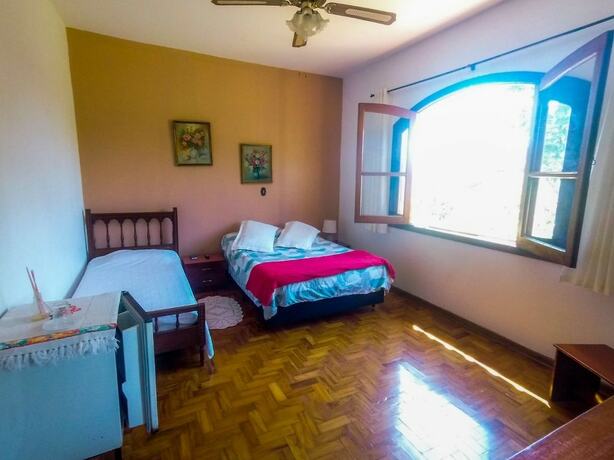 Imagen de la habitación del Hotel Pousada Amanhecer na Mantiqueira. Foto 18