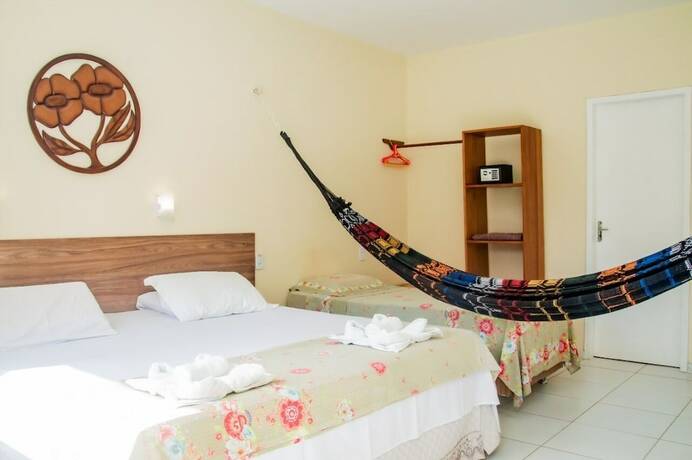 Imagen de la habitación del Hotel Pousada Angelica. Foto 15