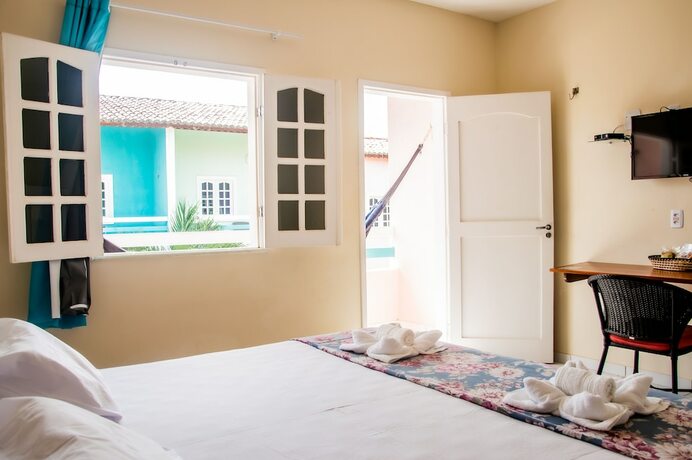 Imagen de la habitación del Hotel Pousada Angelica. Foto 16