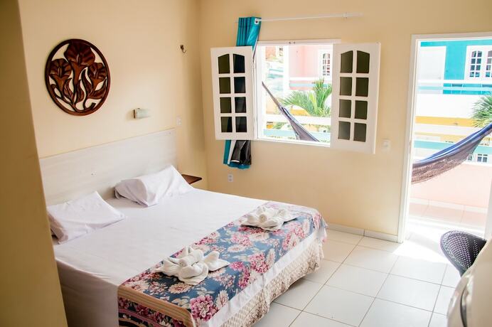 Imagen de la habitación del Hotel Pousada Angelica. Foto 17