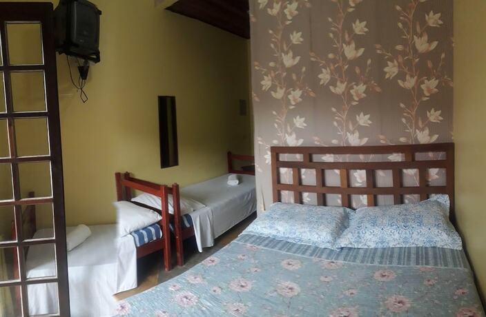 Imagen de la habitación del Hotel Pousada Aquarela Maresias. Foto 15