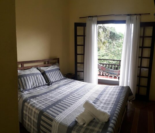 Imagen de la habitación del Hotel Pousada Aquarela Maresias. Foto 17
