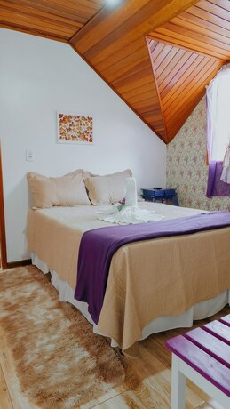 Imagen general del Hotel Pousada Arauc&aacute;ria Su&iacute;tes. Foto 8
