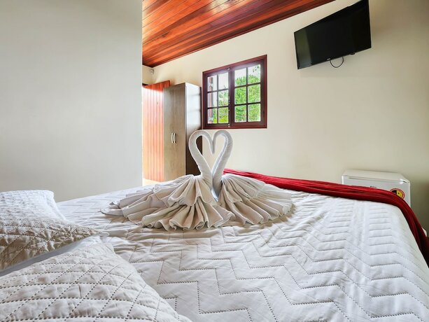 Imagen de la habitación del Hotel Pousada Arauc&aacute;ria Village. Foto 18
