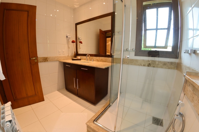 Imagen de la habitación del Hotel Pousada Ares Da Serra - Centro. Foto 8