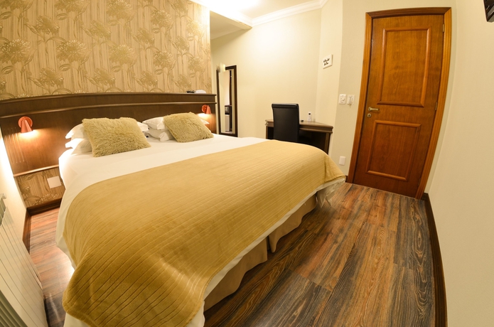 Imagen de la habitación del Hotel Pousada Ares Da Serra - Centro. Foto 11