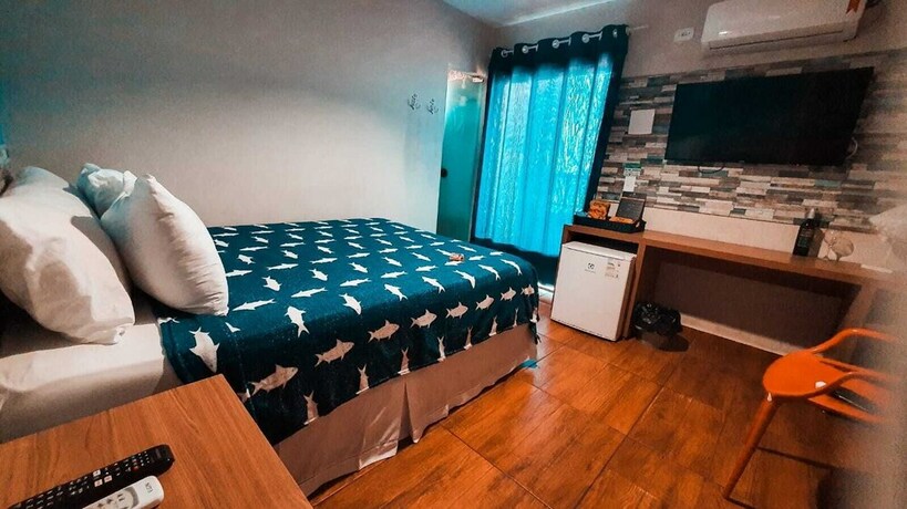 Imagen de la habitación del Hotel Pousada Beach House Coqueirinho. Foto 13