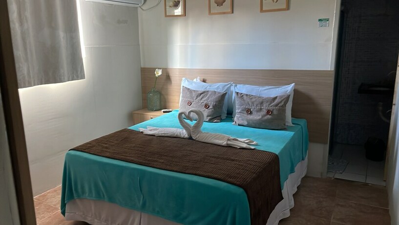 Imagen de la habitación del Hotel Pousada Beach House Coqueirinho. Foto 15