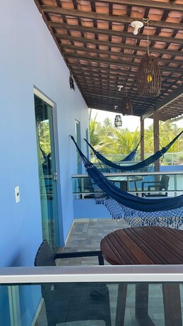 Imagen de la habitación del Hotel Pousada Beach House Coqueirinho. Foto 17