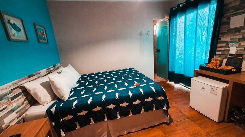 Imagen de la habitación del Hotel Pousada Beach House Coqueirinho. Foto 19