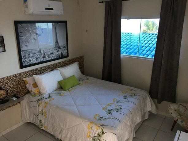 Imagen de la habitación del Hotel Pousada Beach House Coqueirinho. Foto 20