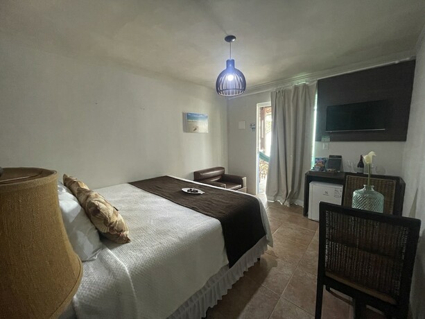 Imagen de la habitación del Hotel Pousada Beach House Coqueirinho. Foto 21